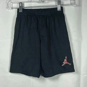 Air Jordan black gym shorts boys size large 6-7 yrs red logo